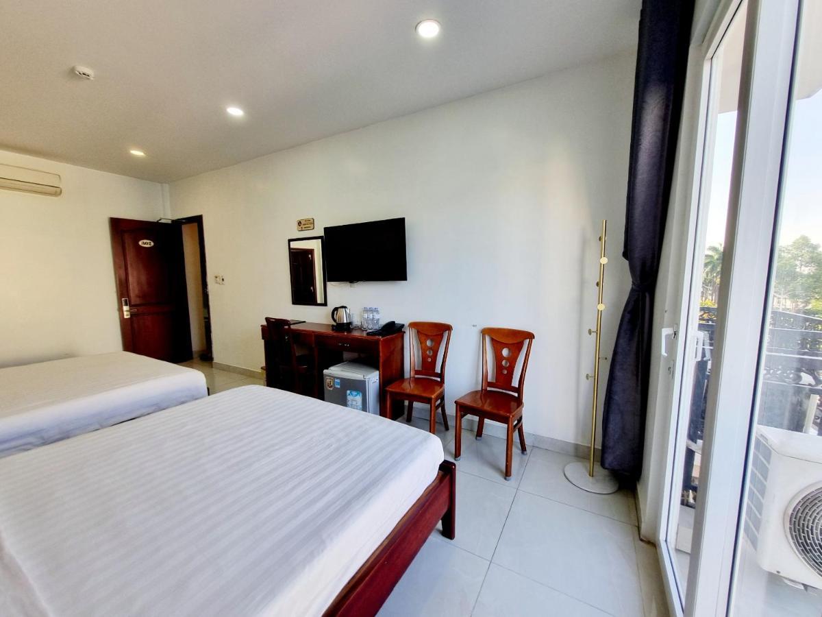 Minh Khue Hotel หวินห์ลอง ภายนอก รูปภาพ